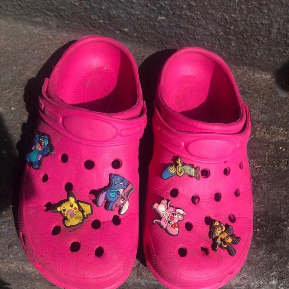 Vibrant Pink Foam Slippers with Decorative Charms